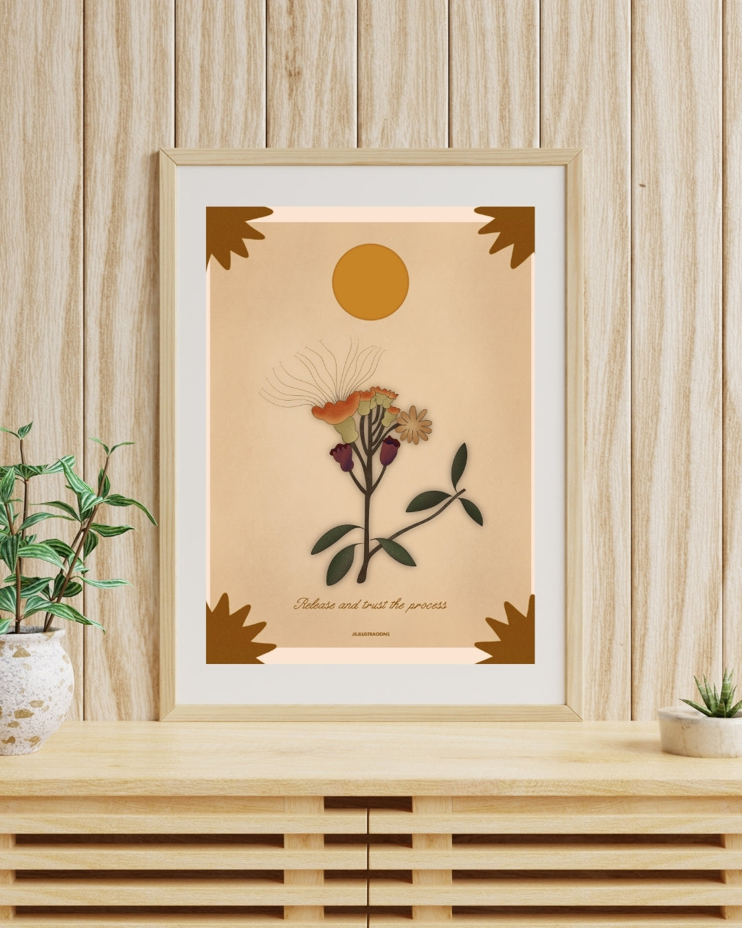 Cuadro con frase de confianza y crecimiento personal enmarcado en madera clara de JR.Ilustracions.