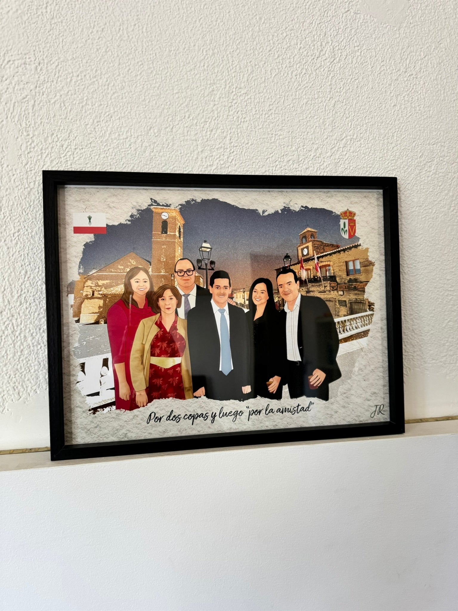 Cuadro de retrato personalizado a partir de fotografía familiar enmarcado en color negro elegante.